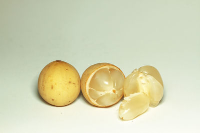 Close-up of candies against white background