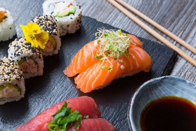 Close-up of sushi served on table