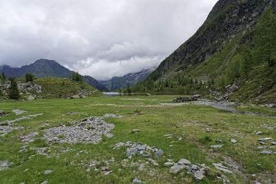 Scenic view of landscape and mountains against sky