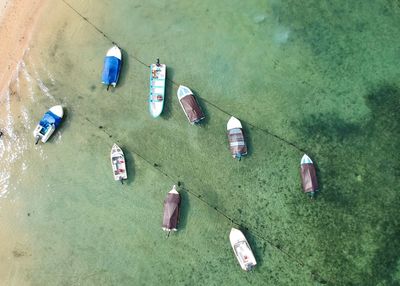 High angle view of boats moored on sea