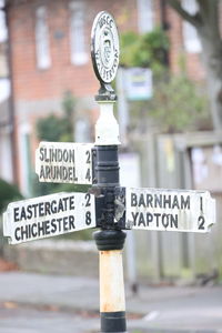 Close-up of information sign on road