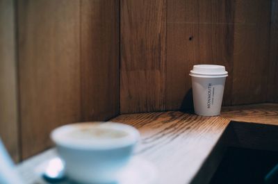 Coffee cup on table