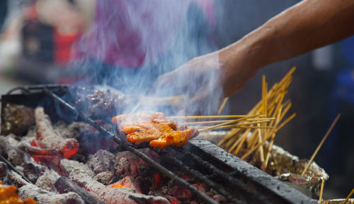 Close-up of meat on barbecue grill