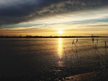 Scenic view of sea against sky during sunset