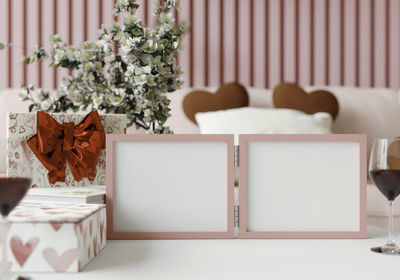 Close-up of white flowers on table at home