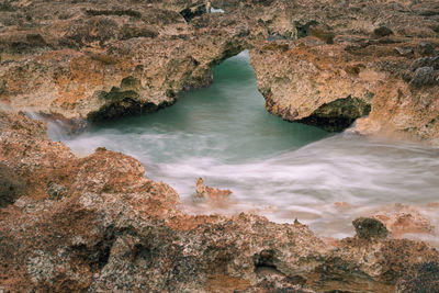 Waves crashing on the rocks, long exposure