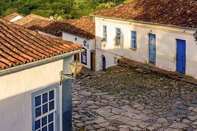 Antique colonial houses and stone street at historical city of tiradentes