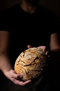 Midsection of woman holding food