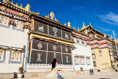 Group of people in front of building