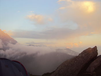Scenic view of mountains against sky during sunset