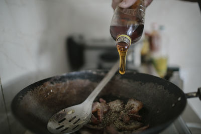 Close-up of hand cooking