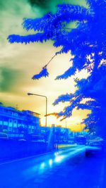 Road against cloudy sky at sunset