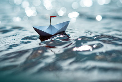 Close-up of paper floating on water