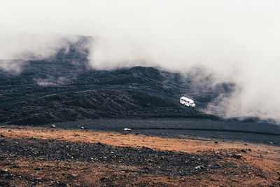 Scenic view of land against sky