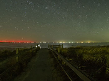 Scenic view of sea against sky at night