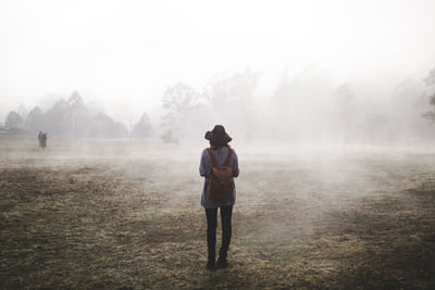 Scenic view of mountains in foggy weather