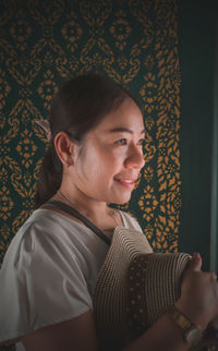 Portrait of young woman smiling