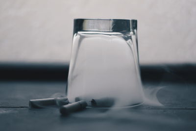 Close-up of glasses on table