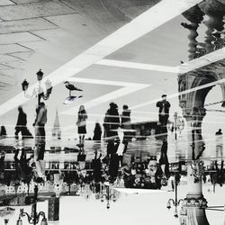 High angle view of people walking on road