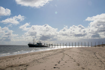 Scenic view of beach against sky