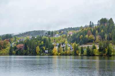 Scenic view of lake against sky during autumn