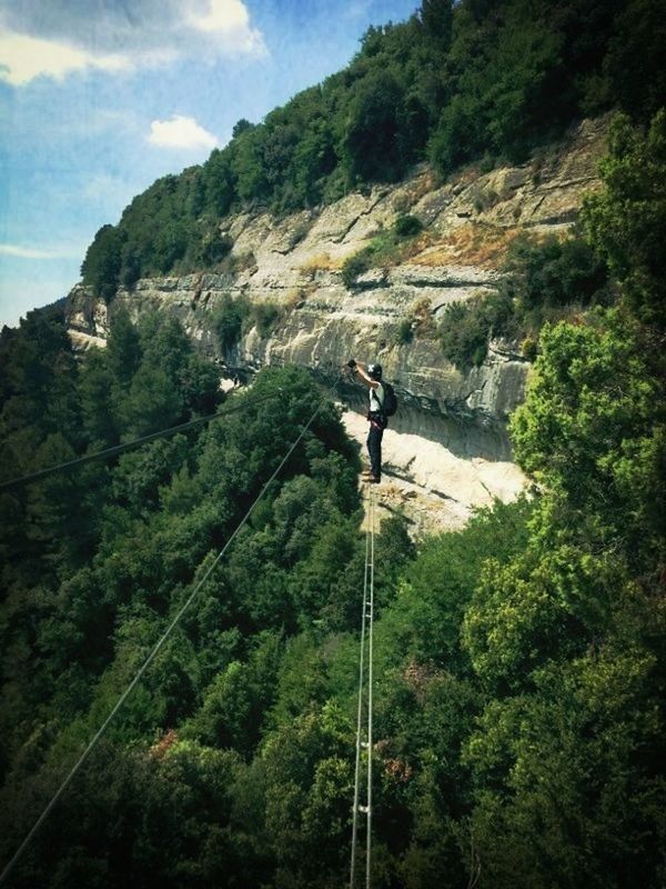 mountain, leisure activity, lifestyles, men, tree, adventure, mountain range, hiking, full length, low angle view, sky, tranquility, nature, beauty in nature, scenics, tranquil scene, non-urban scene, person