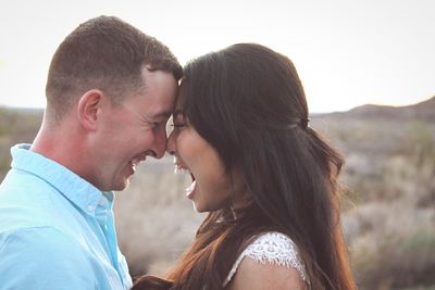 Side view of couple kissing