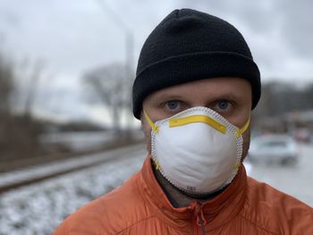 Portrait of man wearing mask