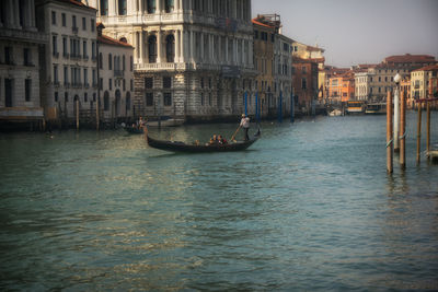 Traditional gondola at grand canal in venice, italy 