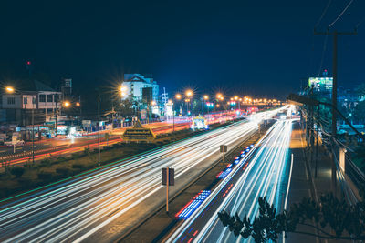 High angle view of light trails on city street