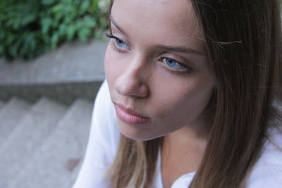 Close-up of woman looking away