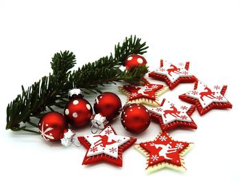 Close-up of christmas tree against white background