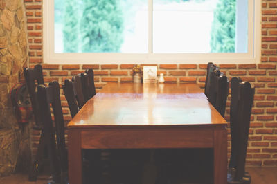 Empty chairs and table in restaurant