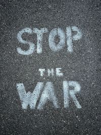High angle view of text on road