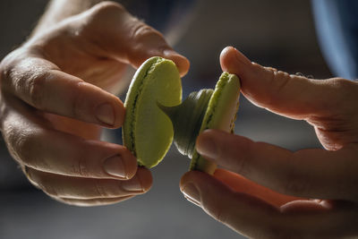 Close-up of hand holding ice cream