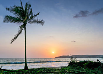 Scenic view of sea against sky at sunset