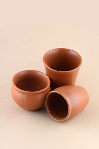 High angle view of tea on table against white background