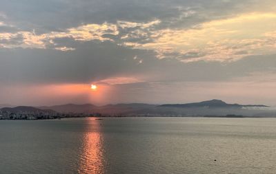 Scenic view of sea against sky during sunset
