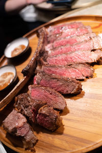 High angle view of meat on barbecue grill