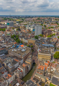 High angle view of buildings in city against sky