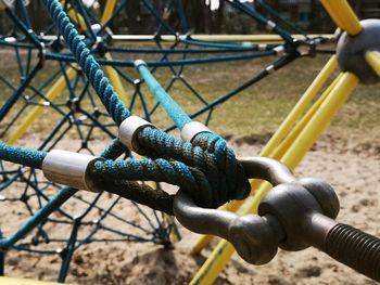 Close-up of rope tied to bollard