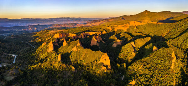 Scenic view of landscape against sky during sunset