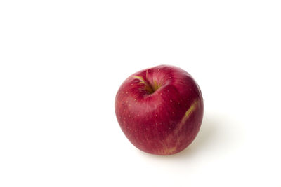 Close-up of apple against white background