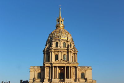 Low angle view of cathedral against blue sky