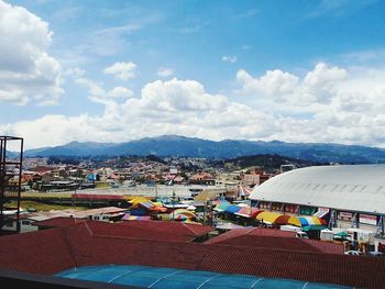 Scenic view of residential district against sky