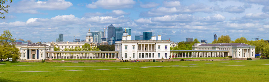 View of buildings against cloudy sky