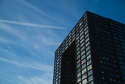 Low angle view of building against blue sky