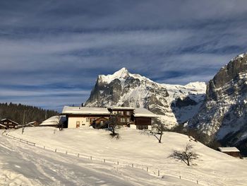 Scenic view of snowcapped mountains against sky