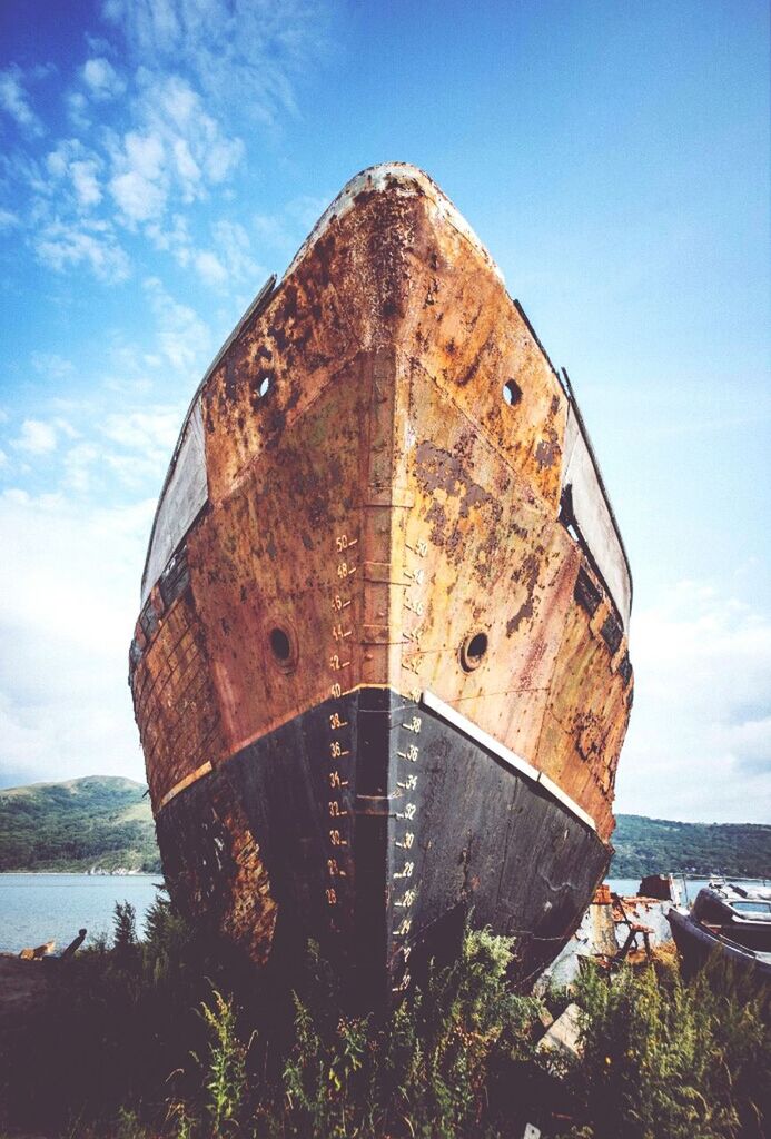 abandoned, sky, damaged, water, built structure, obsolete, old, architecture, deterioration, run-down, rusty, building exterior, day, cloud - sky, weathered, no people, nautical vessel, outdoors, nature, transportation