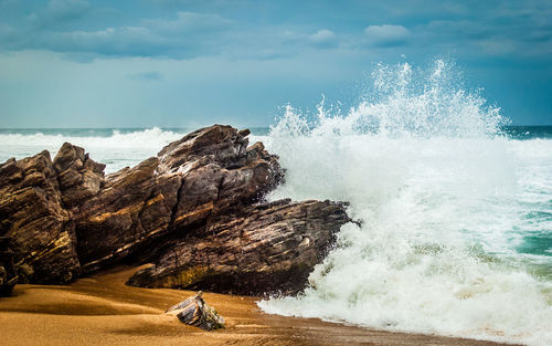 High angle view of sea waves rushing towards shore